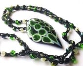 Crocheted Beaded Necklace with Large Green, Black and White Glass Pendant - 24"