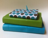 Set of three leather and fabric journals