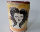 cup with 2 faces