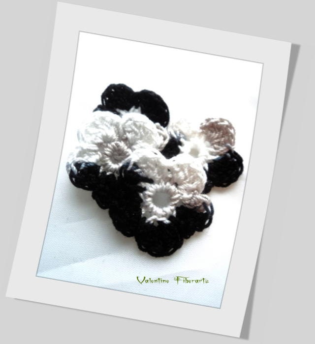 Small black, white and gray crochet flowers