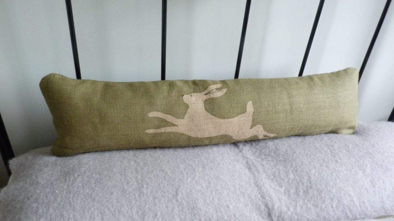 hand printed soft olive green reversible hare bolster