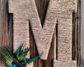 Jute and peacock feather monogram wreath hanger