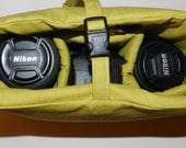Add a clip to your padded insert camera bag by Darby Mack