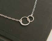 Tiny linked circles necklace in sterling silver, entwined links, interlocking circles, connected rings, two circles