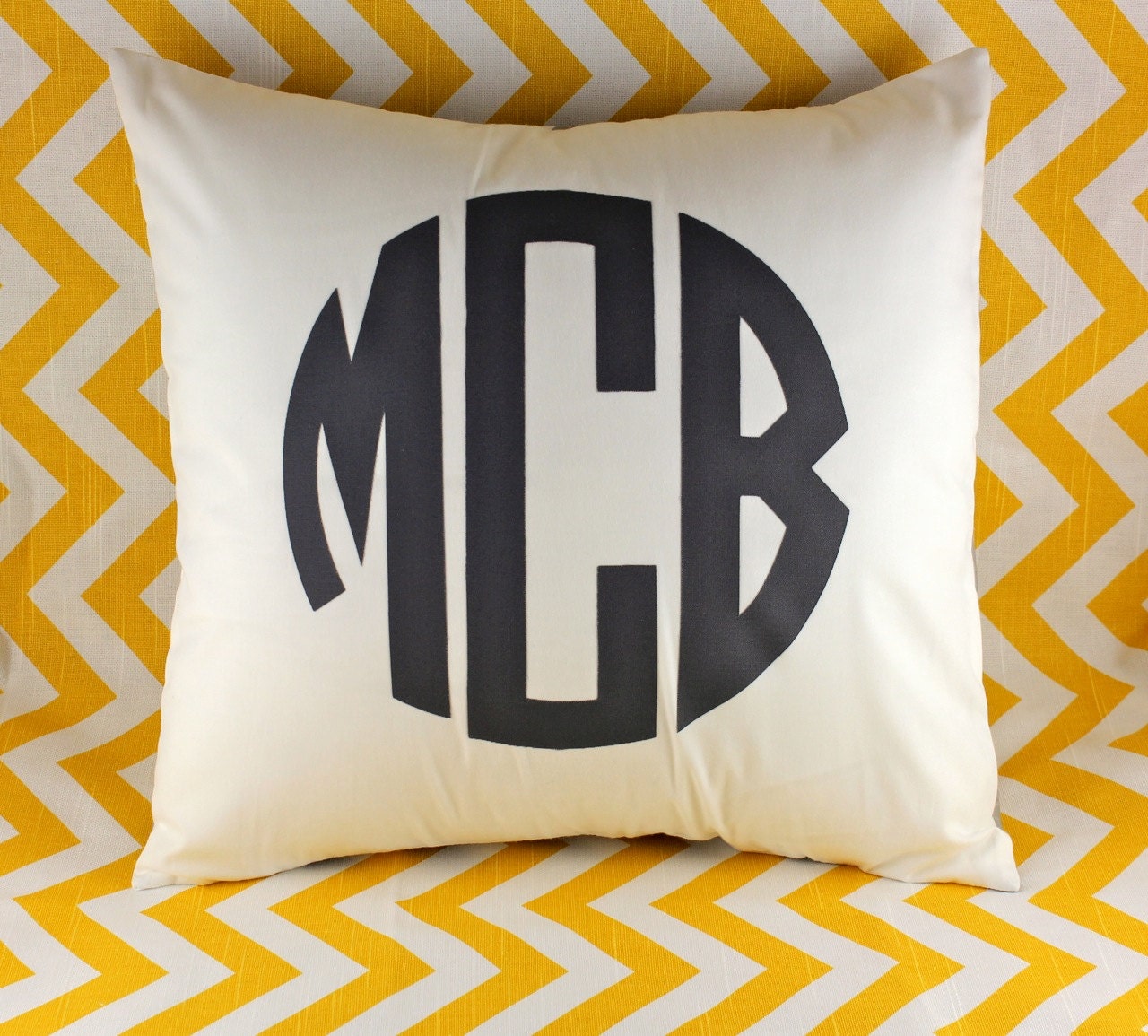 custom circle monogram pillow.  custom applique.  comes in any color or design.