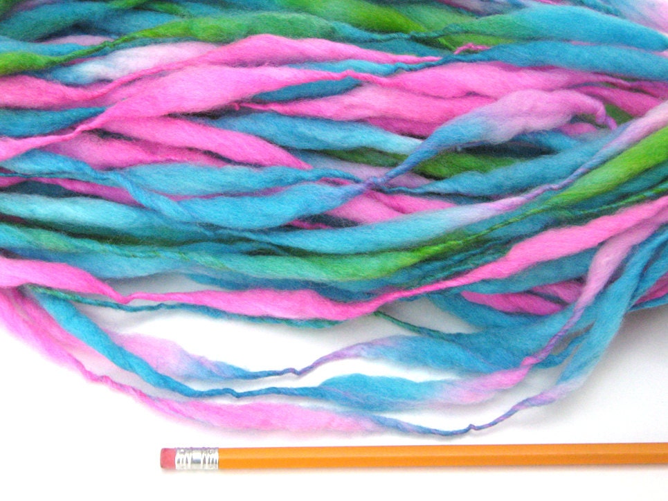 48 yards and 1.7 ounces handspun yarn, spun thick and thin in merino wool