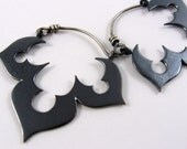 Genie's black lotus earrings in copper and sterling