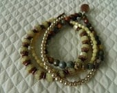 Beautiful cream and earth tone bracelets