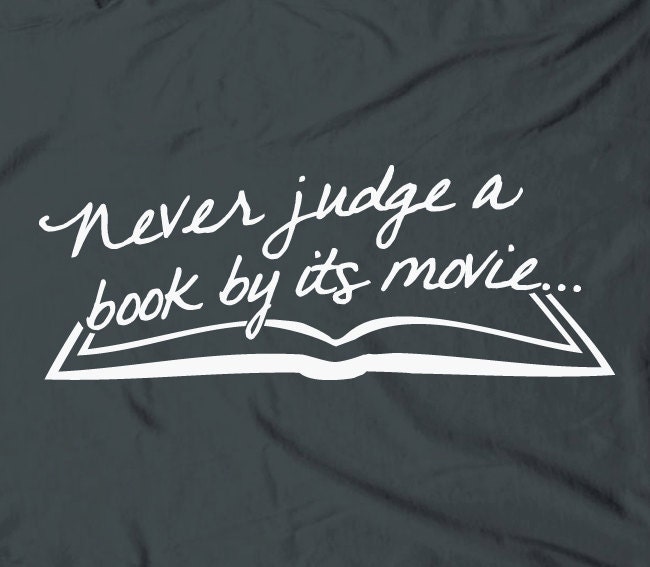 Never judge a book by its movie - humor funny geeky nerdy bookworm text tee t-shirt