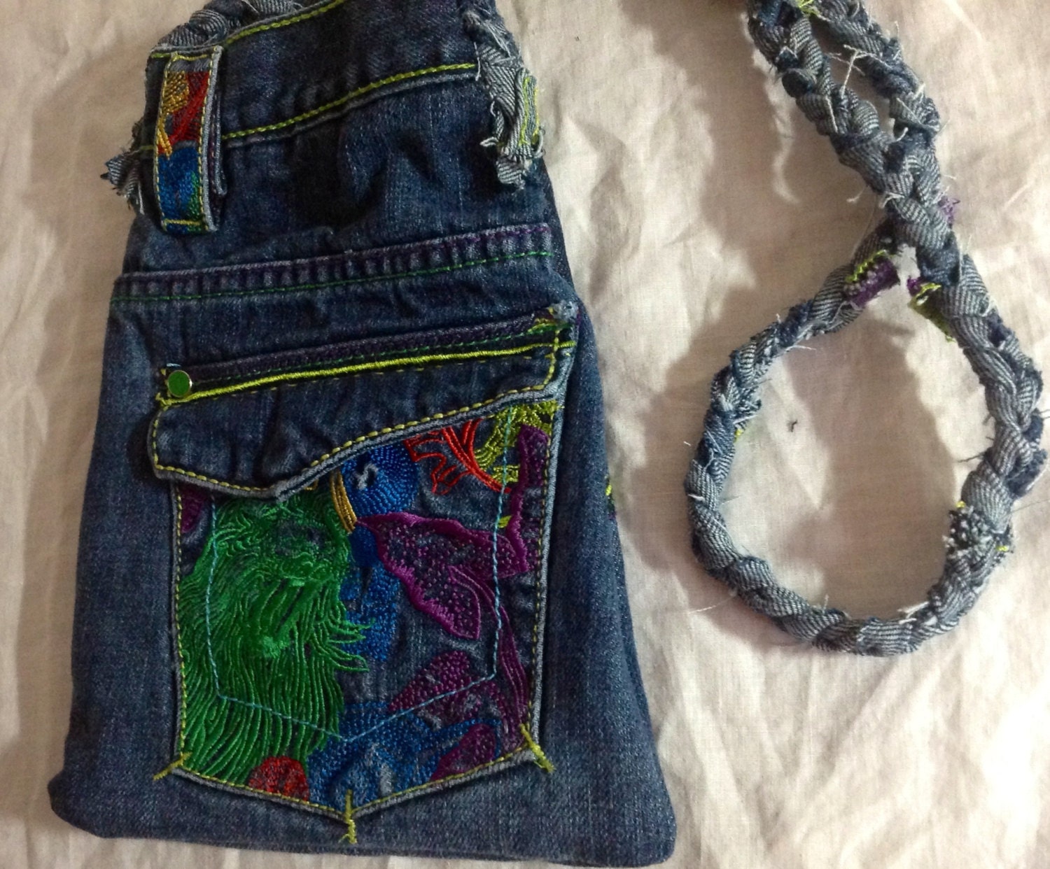 upcycled blue jean purse 3 pockets with beautiful embroidery  Upcycled Denim jeans hand sewn by mcleodhandcrafgifts