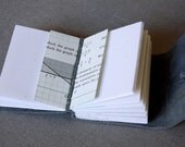 Vintage geometry illustrations inside gray leather book