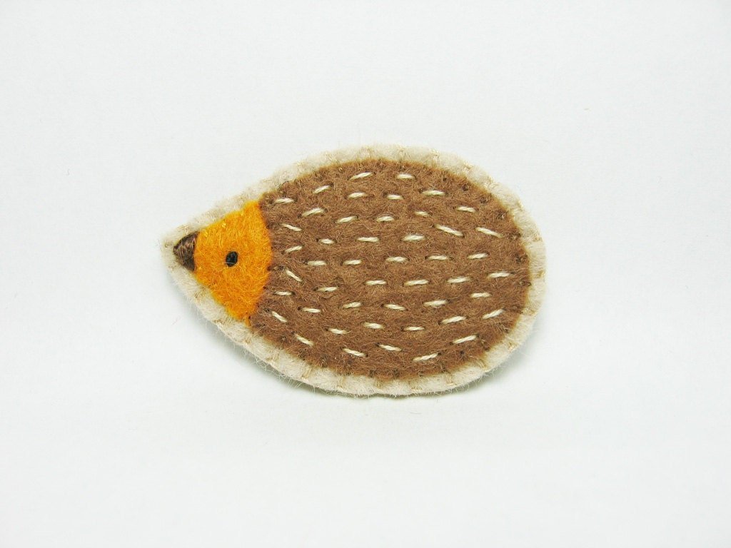 Friendly tanned hedgehog felt pin - small size