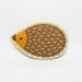 Friendly tanned hedgehog felt pin - small size