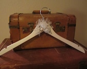 one of a kind custom IVORY BRIDAL HANGER with wire wording and floral, pearl, and rhinestone embellishments