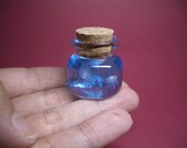 Tiny jellyfish in a tiny bottle