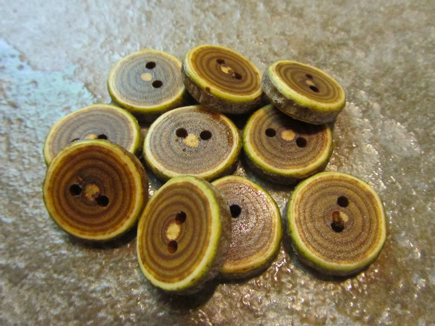 10 Sumac Buttons.  Just Over .75 Inches Wide.