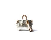 silver holdall