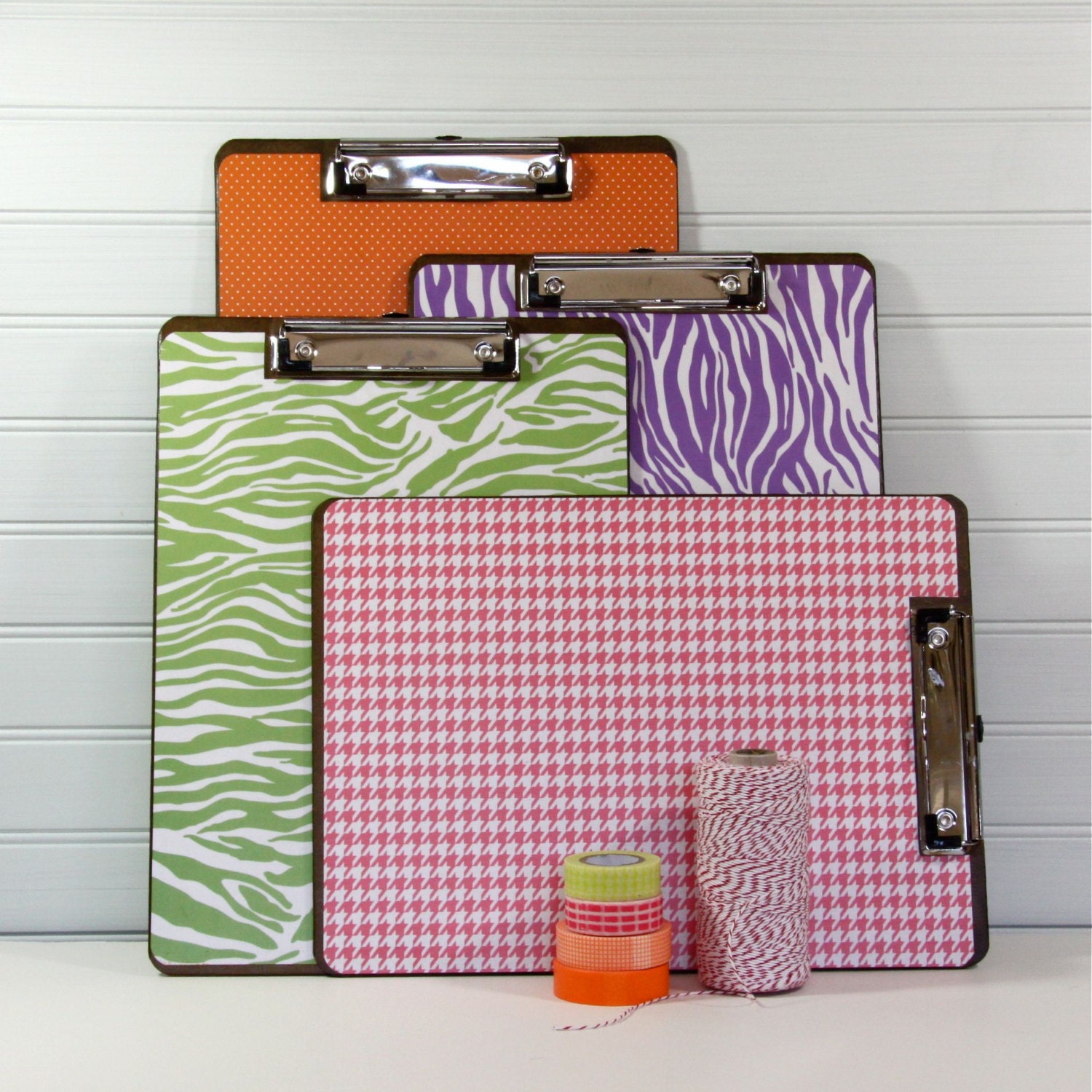Papered Clipboards.  Letter Sized.  Low Profile. Set of Four Bolds.