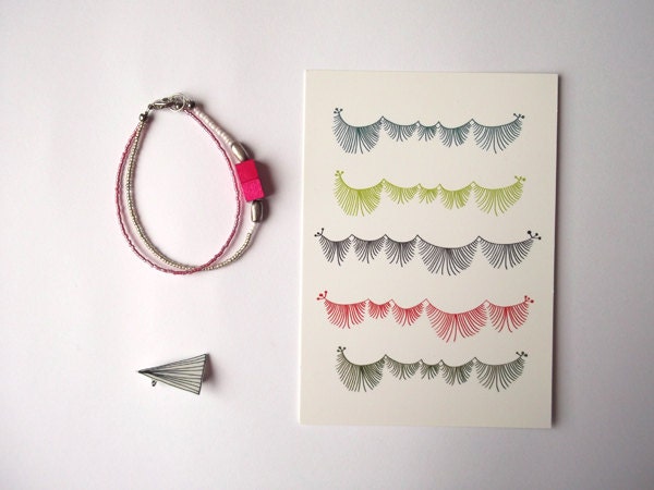 Goodie bag 7 - postcard, brooch and bracelet