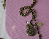 GIFT WITH PURCHASE Vintage inspired round locket, skeleton key cluster with basket weave heart, aqua stone & green vintage teardrop