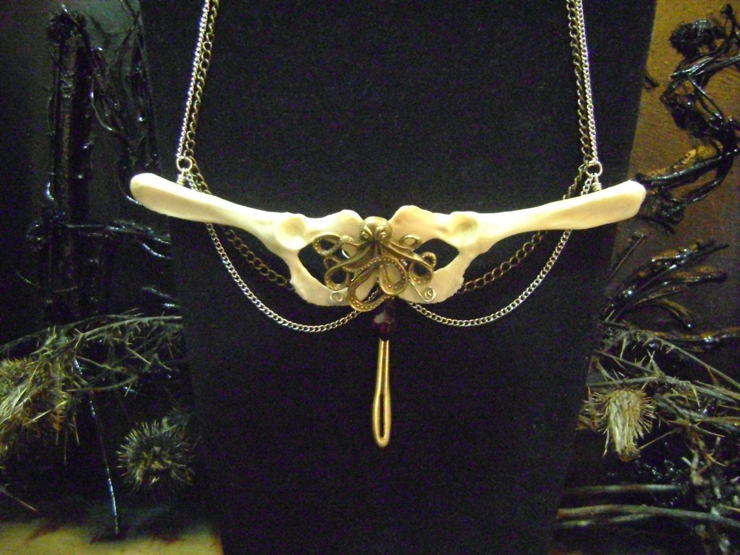 Octopus in Chains --real hip bones with octopus and chains necklace