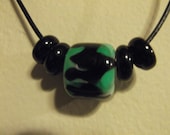 hand blown black and green glass beads necklace