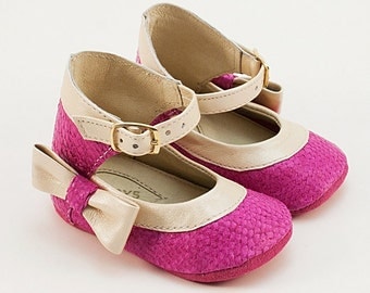Baby shoes from pink fish leather