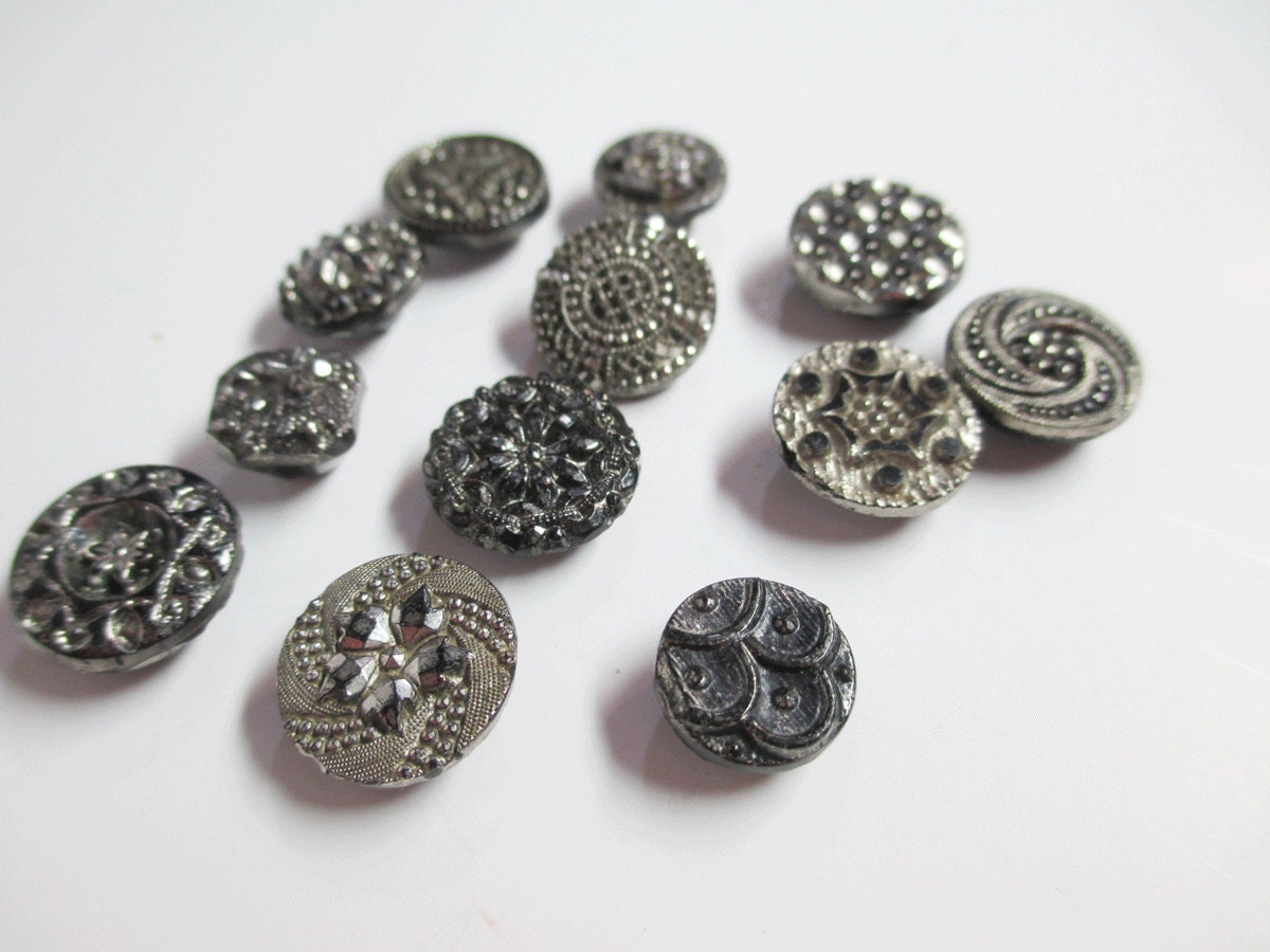 12 Antique Luster Buttons Black Glass - Victorian Era - early 1900s - Silver and Black