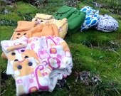 large set of 6 organic cotton fitted diapers various colors and prints