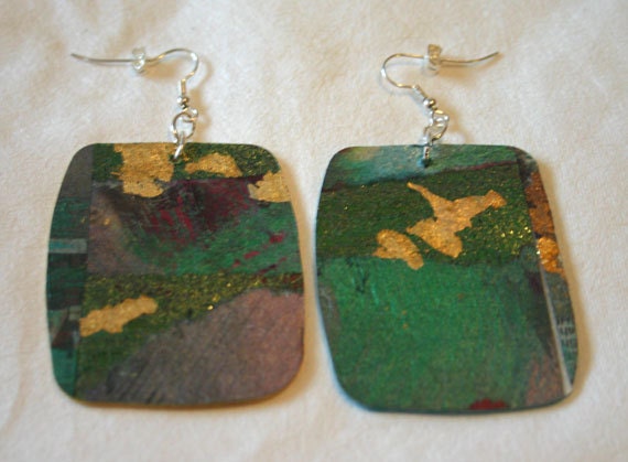 Large drop earrings made from recycled newspaper, gilding flake and heavy interfacing with silver fixings.