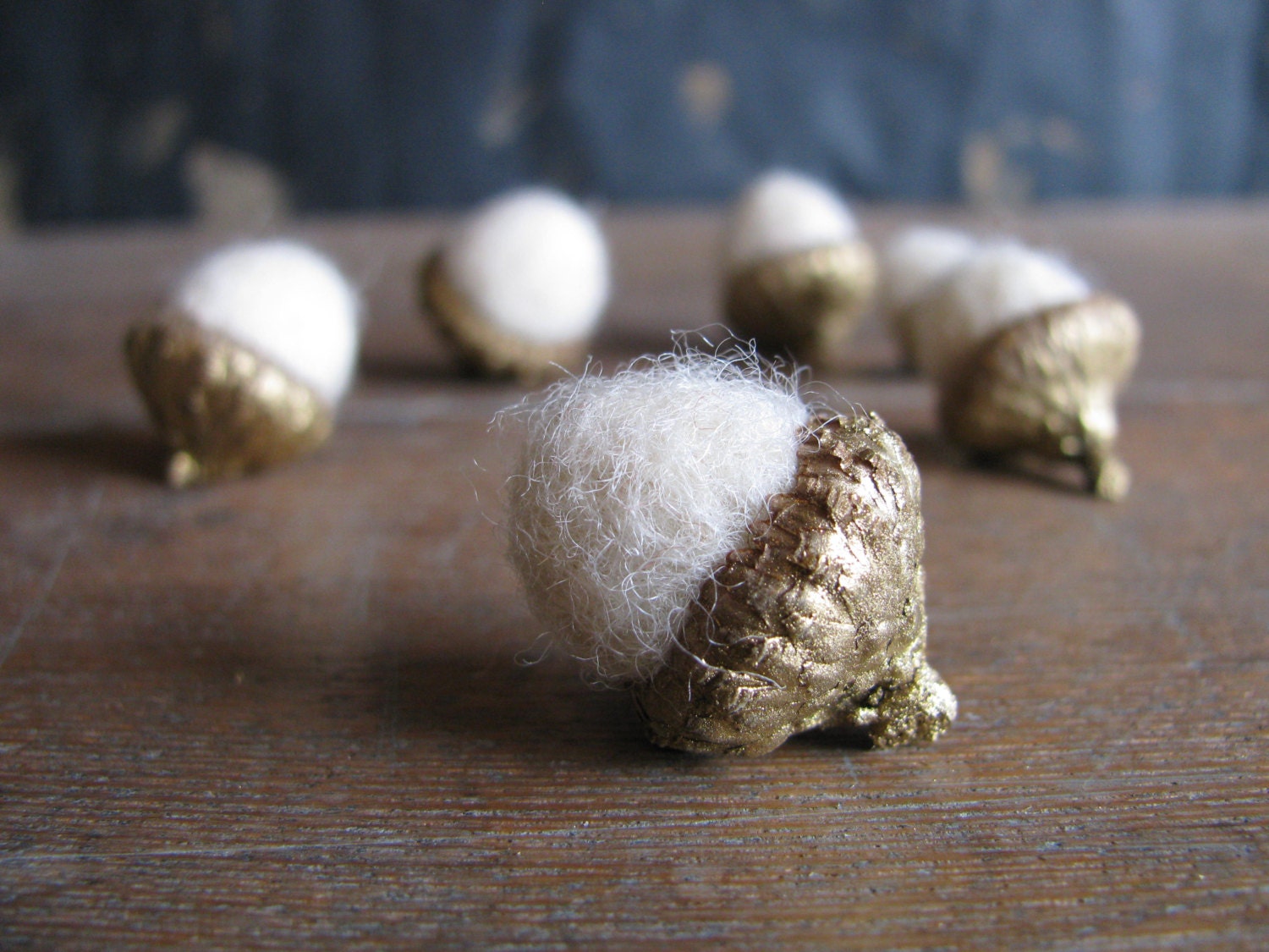 Felted wool acorns, set of 6, gold-colored caps, white