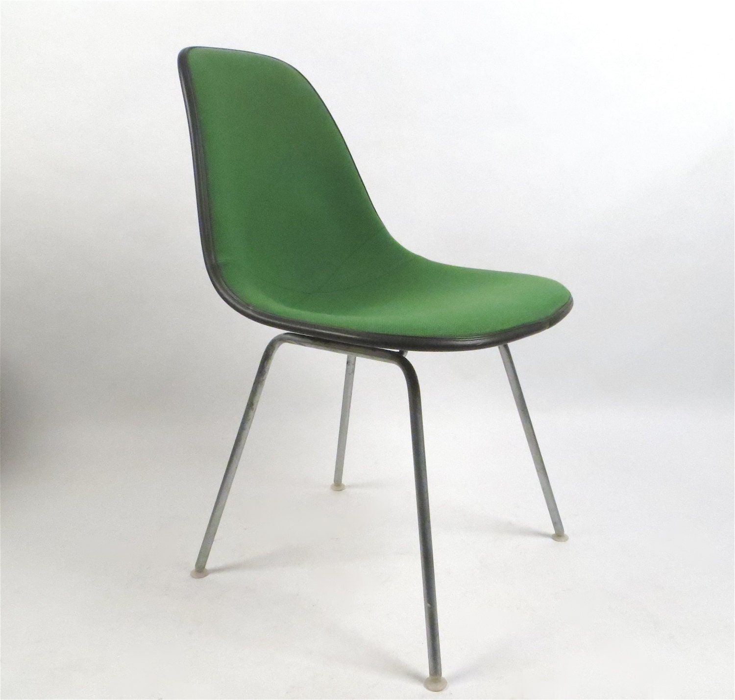 Herman Miller Eames bright green and black fiberblass chair. Free shipping in the USA