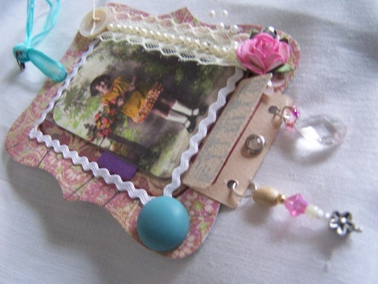 Little girl tag, with bouquet of flowers