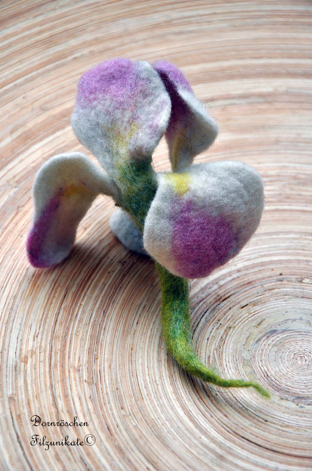 Iris brooches