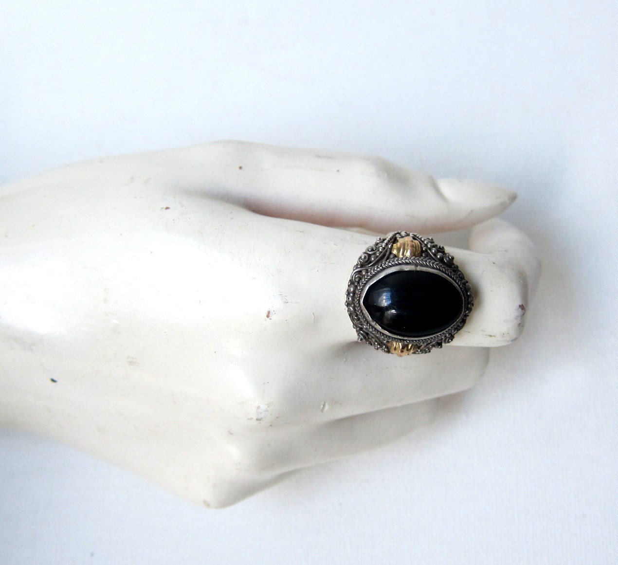 Vintage 1970s sterling silver and gold black onyx dress ring