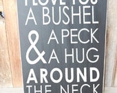 I love you a bushel and a peck and a hug around the neck.- wood Home decor, baby nursery sign with vinyl lettering