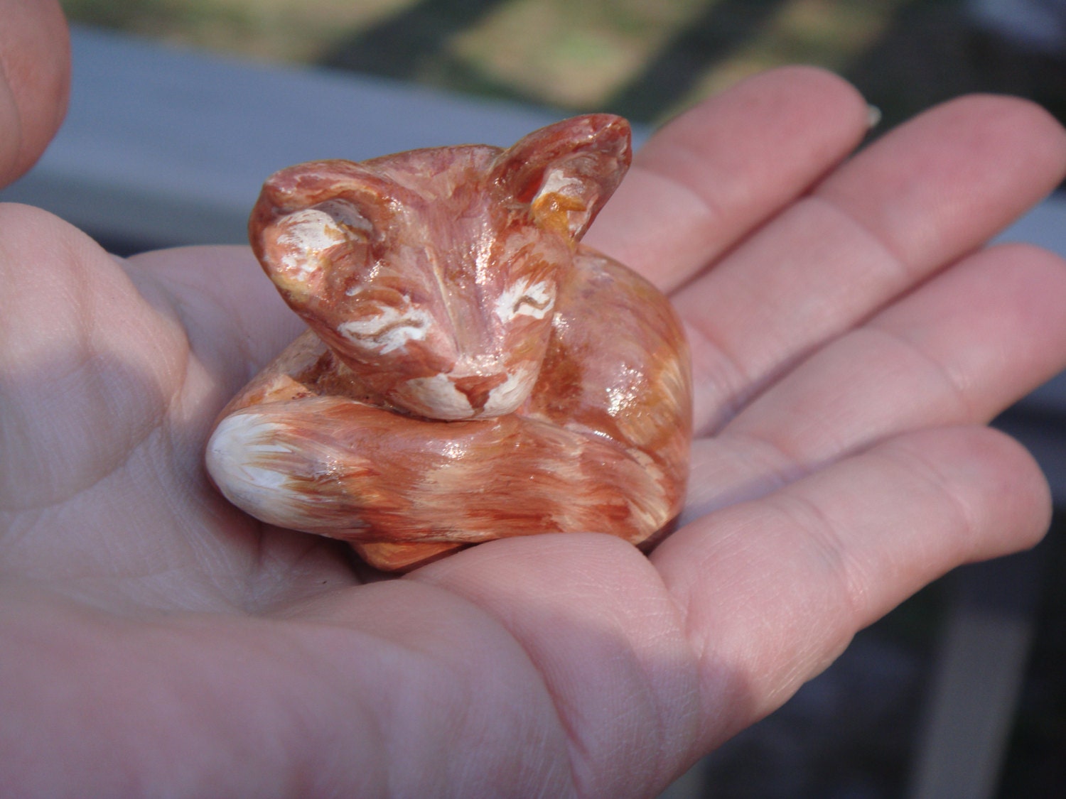 Hand sculpted sleeeping miniature orange tiger cat