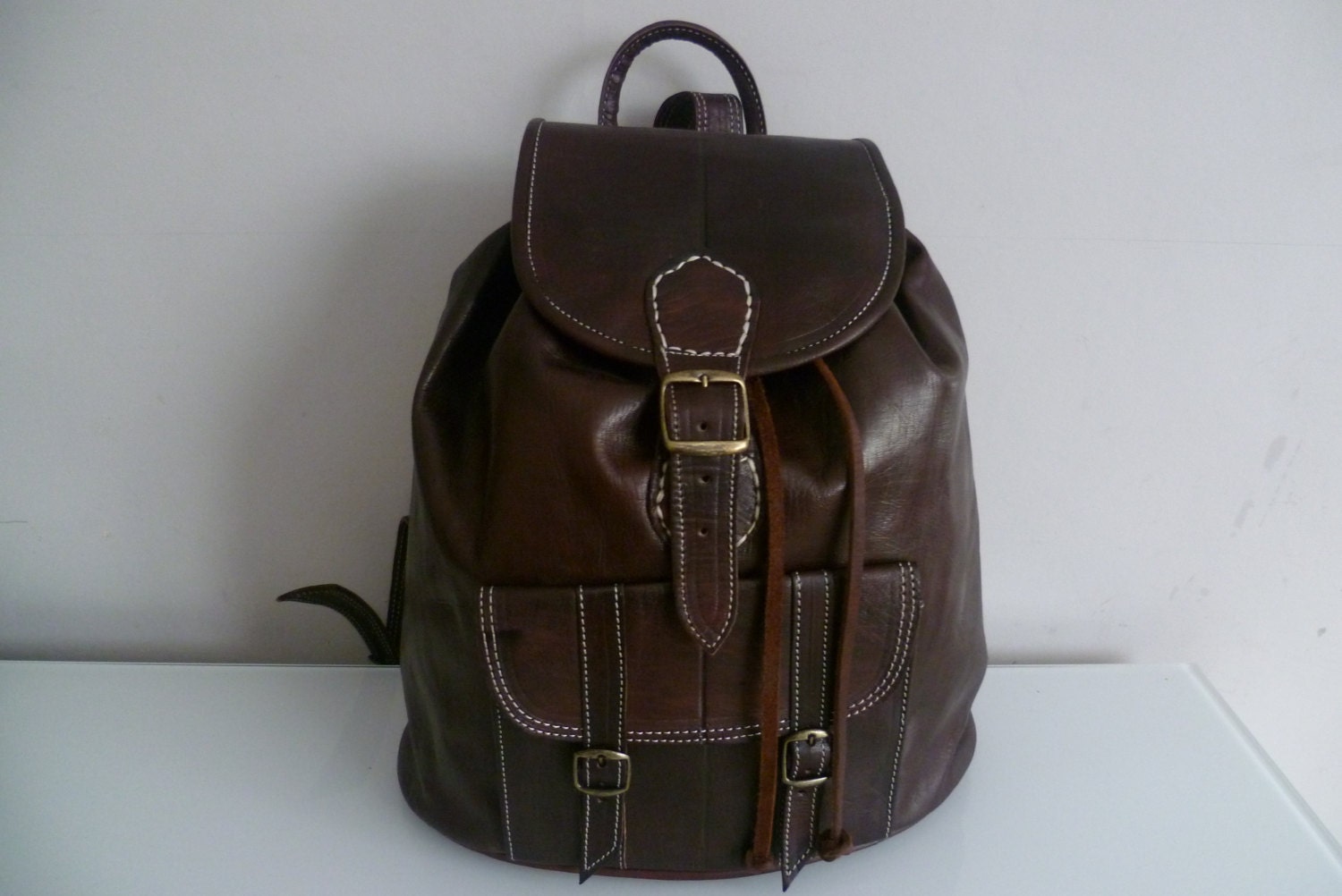 Sale was 75.00 now 65.00brown leather backpack Unisex