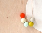 not quite round handmade beads make a necklace