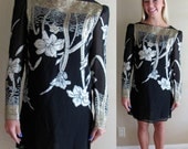 Sheer 1980's Nancy Bracoloni Shangri La Boat Neck Black Mini Dress With Gold and Silver Lamé Floral design - Small - Approximate 3/4