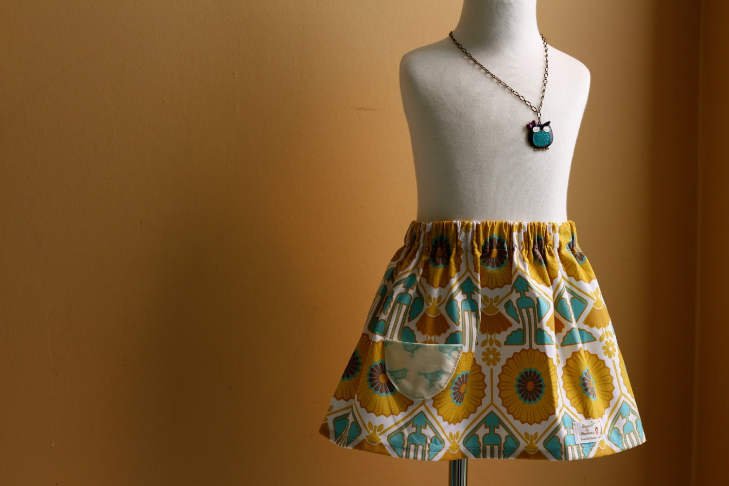Little Girls Skirt   gold and turquoise blue print with small bird print pocket   6-12 mo,12-18 mo,2T,3T,4T,5T