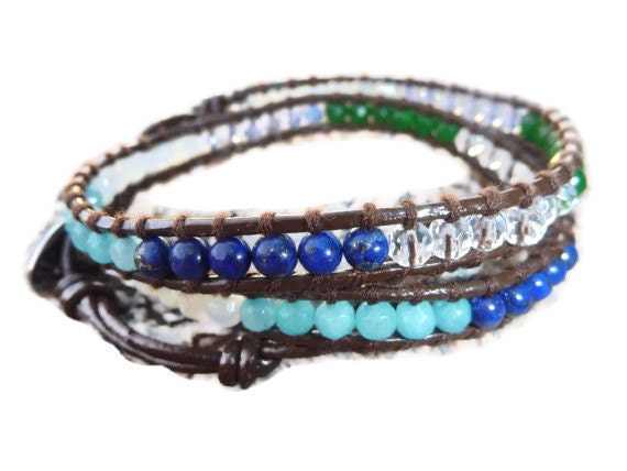 Chan luu inspired  wrap bracelet .Mother pearl, Denim Lapis Lazuli,Swarovski Crystal, Blue and Green Semi Precious Gemstoneon Brown Leather.