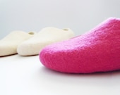 Simple felted wool slippers of  custom chosen color.