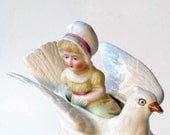 Girl on Bird, china assemblage