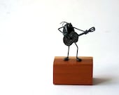 Guitar player figurine, rock god id monster musician by Quayle Metal Sculpture