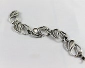 Sarah Coventry bracelet chunky silver open leaf pattern thick modern vintage high fashion