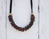 Snake Vertebrae on Leather