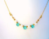 Chain necklace with Rainbow Moonstone, Ocean Blue AA Apatite and Gold Filled beads.