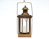 Brass candle lantern for rustic patio or garden decor, vintage from India.