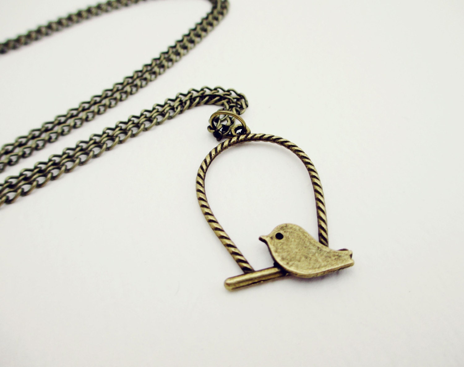 Swinging Bird Bronze Charm Necklace